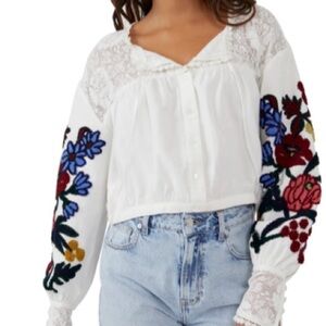 Beautiful Free People embroidered summer blouse.